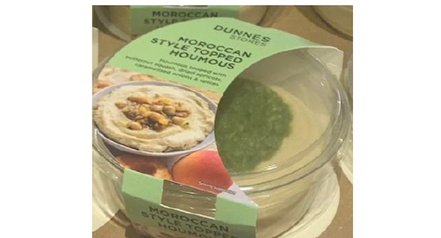 A plastic tub of Dunnes Stores Moroccan Style Topped Houmous