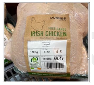 A prepared Dunnes Stores Free Range Irish Chicken in a plastic tray