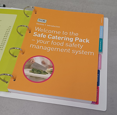 An open Safe Catering Pack lying on a counter